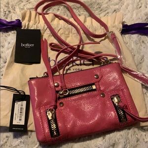Botkier Logan convertible crossbody/wristlet in beet color